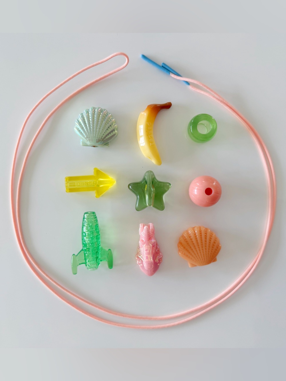 CJ Hendry Pastel beads (9) with one long string